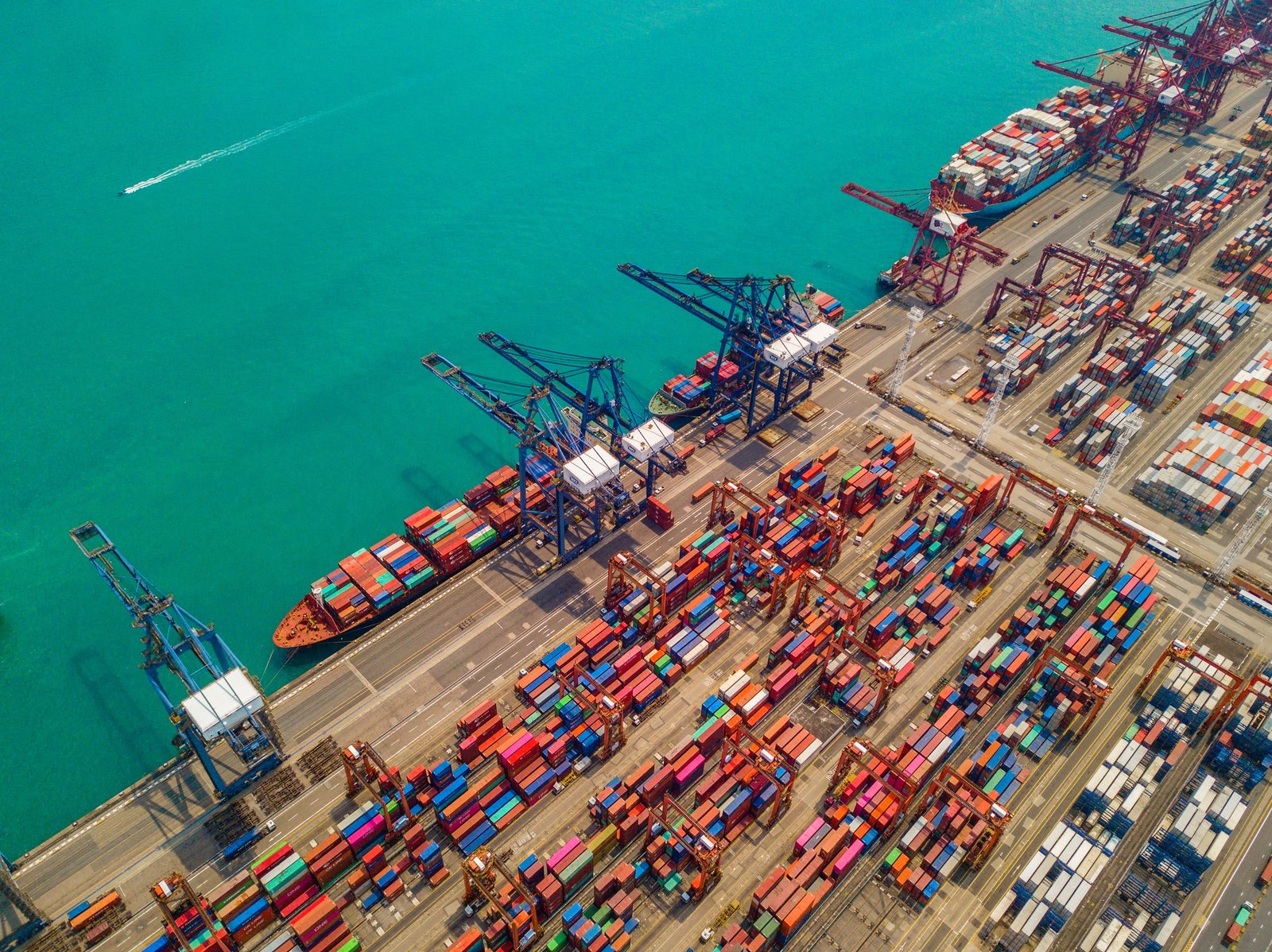 container cargo ship in the export and import business and logistics. Shipping to the harbor